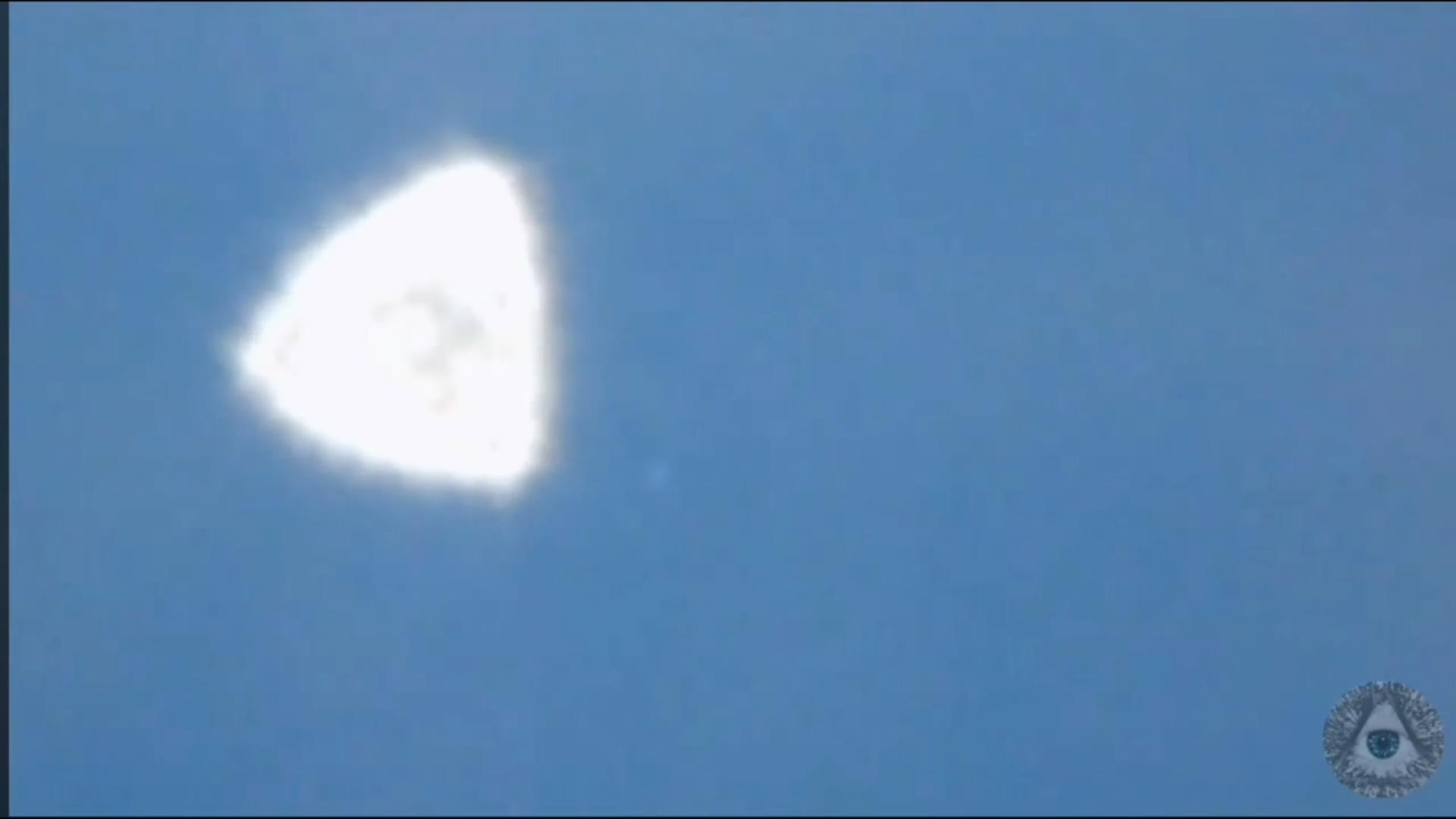 Image of the UFO zoomed in, showing its roughly triangular shape